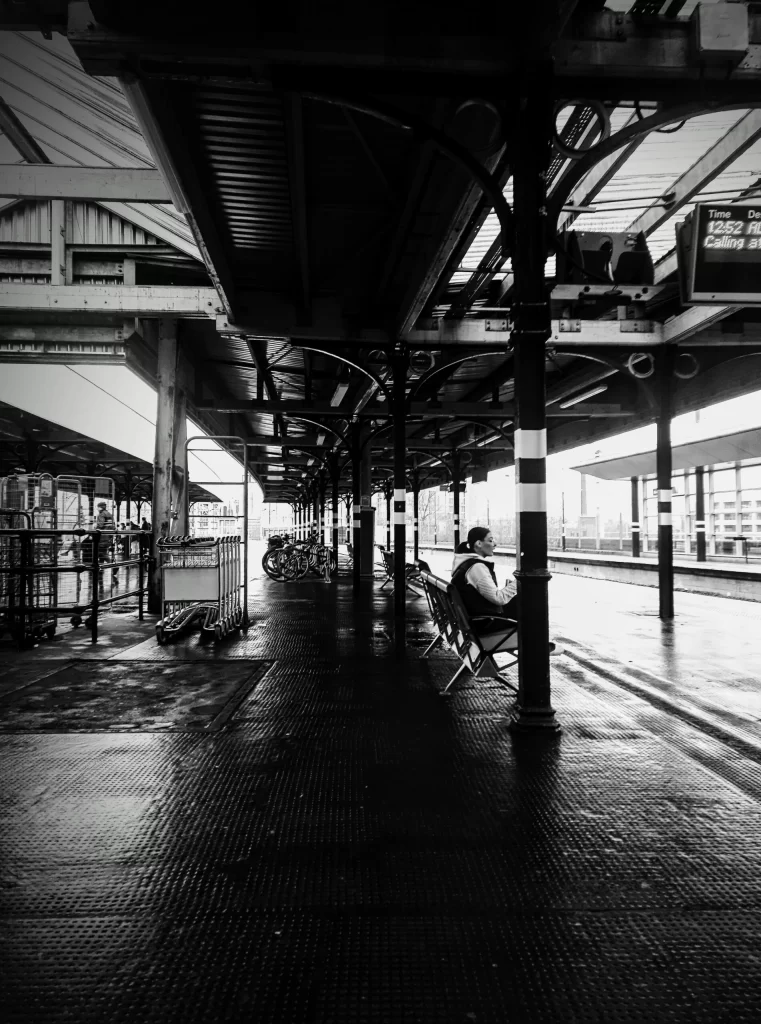 english_train_station_in_england_in_the_rain-761x1024