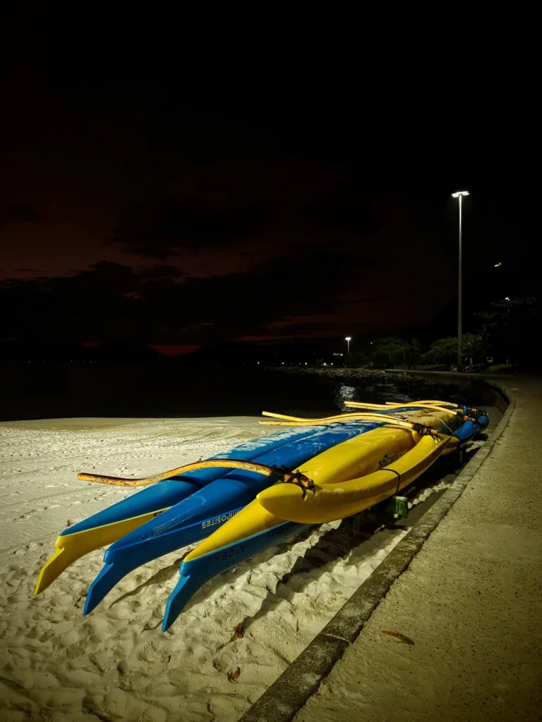 hawaiian_canoes_at_flamengo_beach_at_night_rio-768x1024