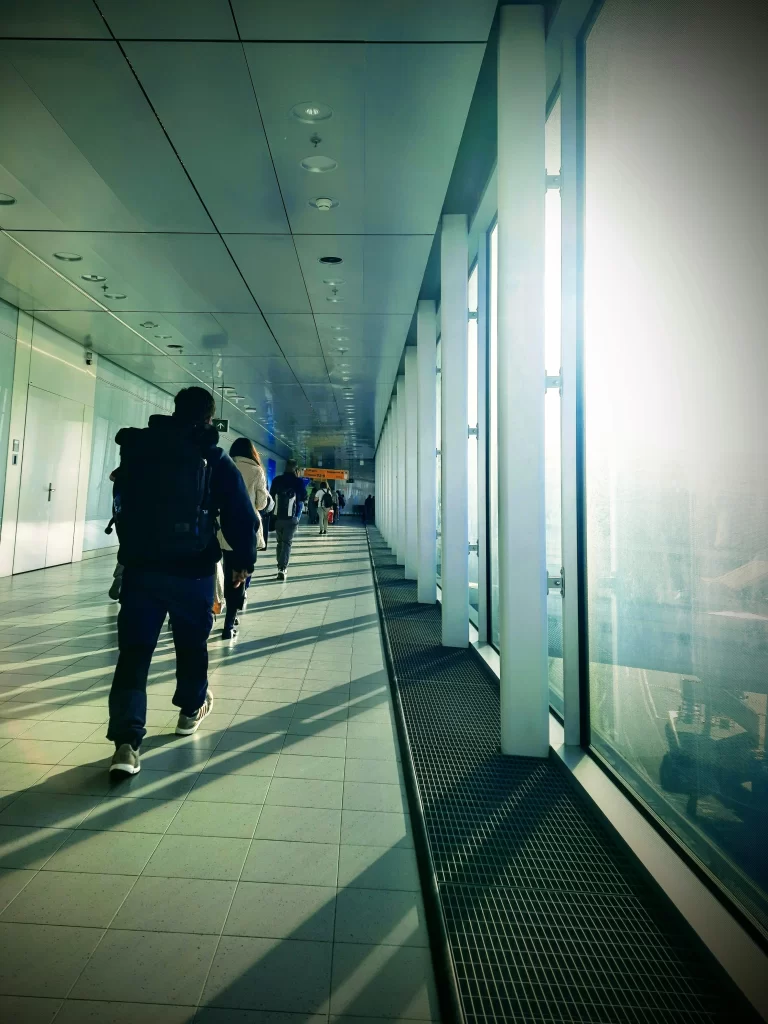 walking_in_the_airport_for_connecting_flight-scaled